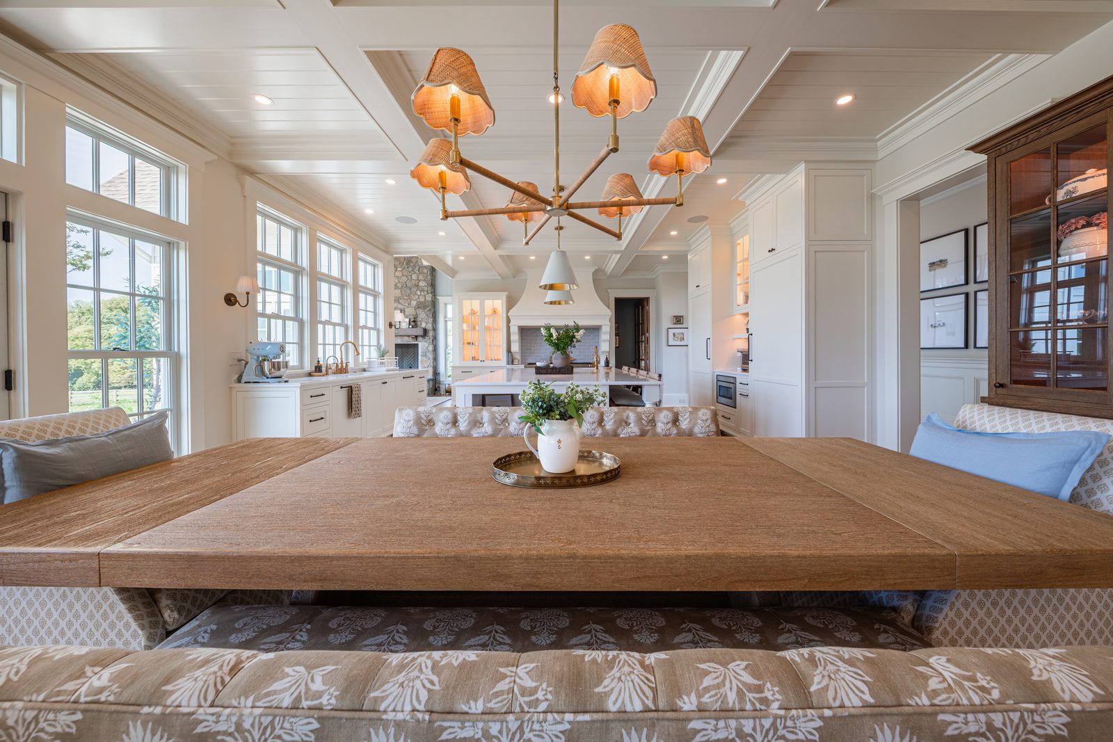The dining table under a coffered ceiling