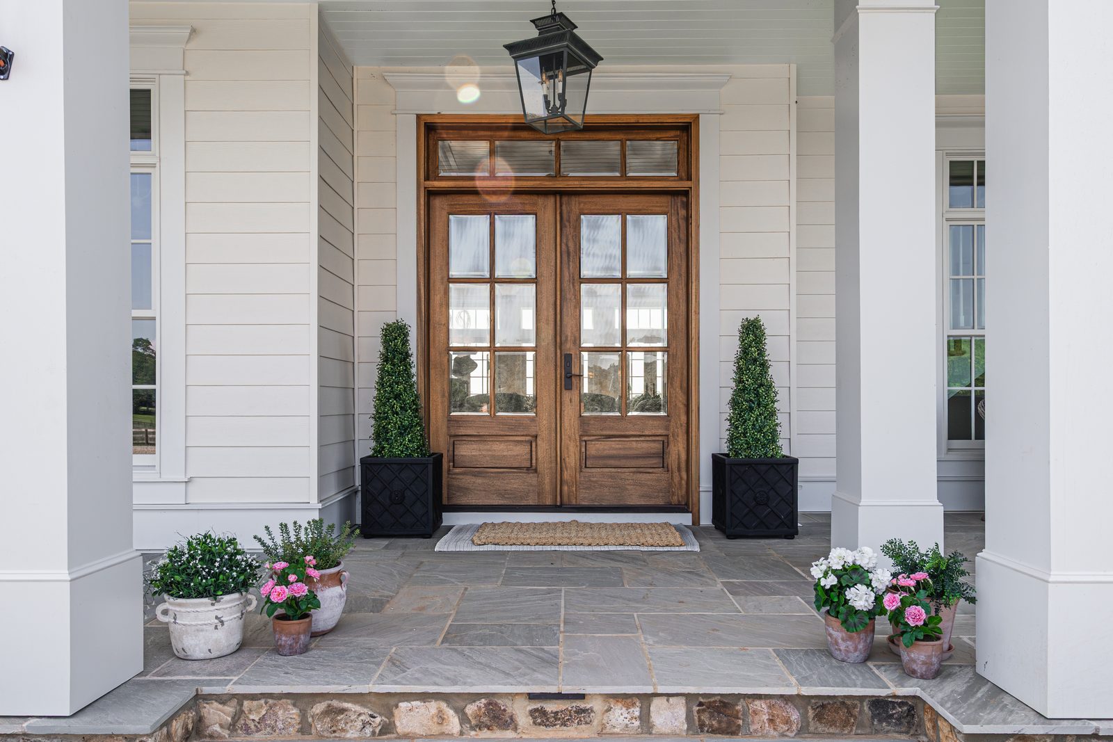The front porch and double doors at Four Tails