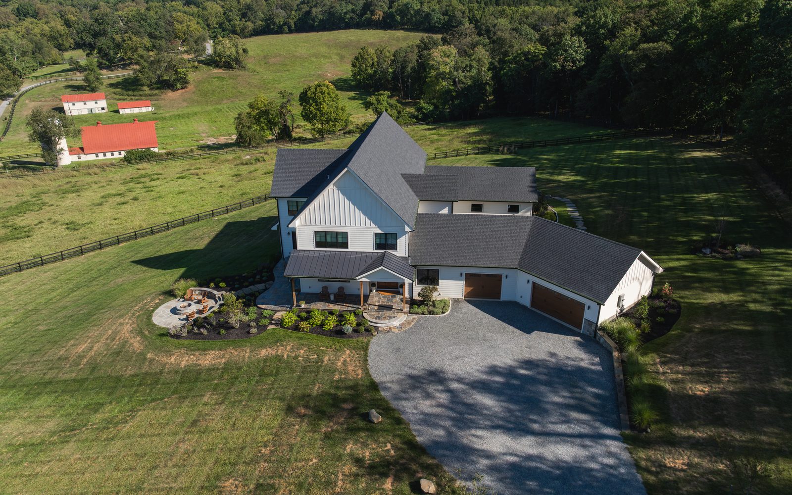 The Monte’s Run house and its drive from the air