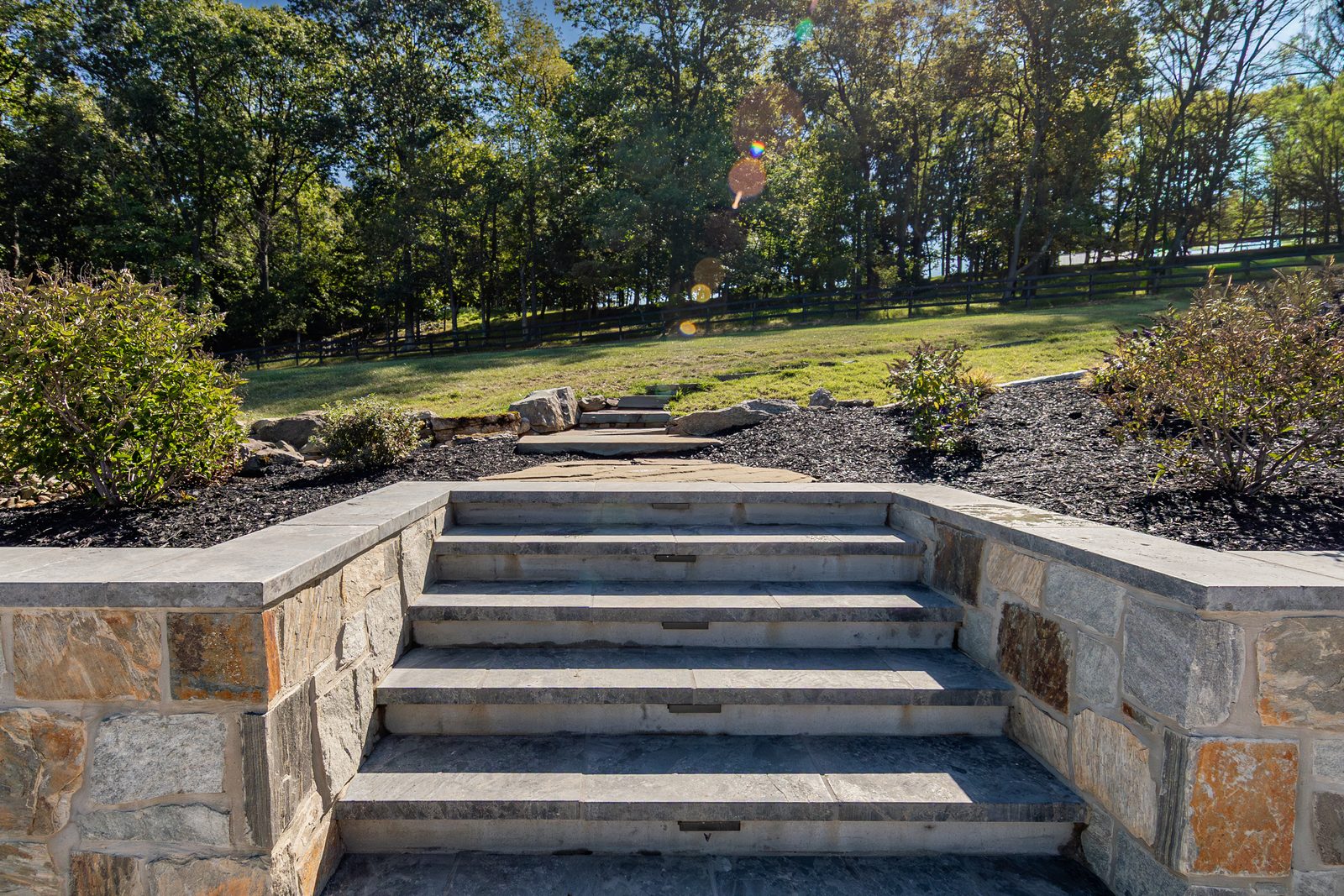 Stone steps leading down into the garden